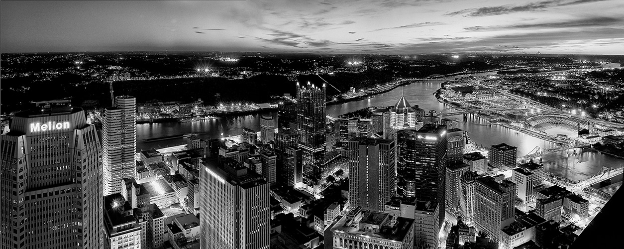 Black and white image of downtown Pittsburgh, shot from the top of the US Steel Tower.
